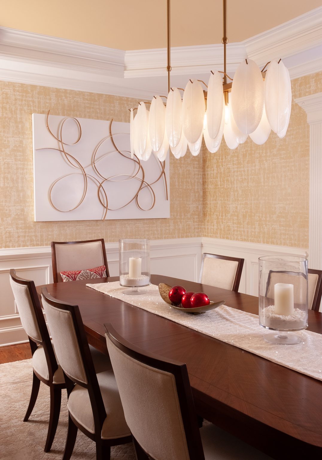 Dining room with white pendant chandelier